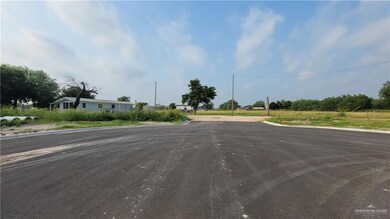 View of asphalt road with curbs