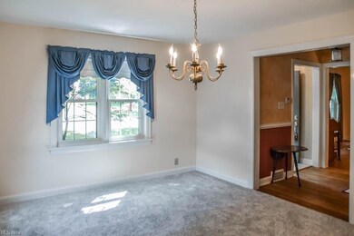 Formal dining room with new carpet!