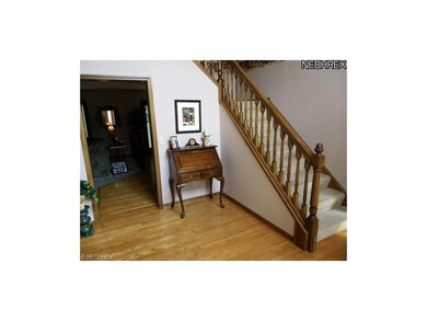 Two Story foyer with hardwood flooring!
