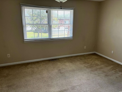 Unfurnished room featuring carpet floors