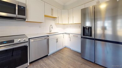 Kitchen featuring appliances with stainless steel