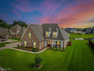View of front of home with a lawn