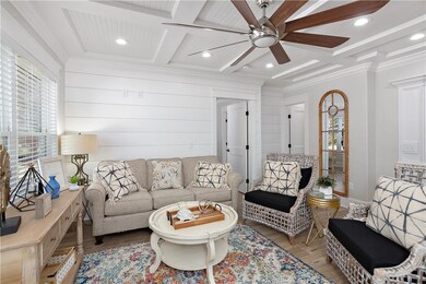 Cozy living area with Shiplap accent walls and Cof