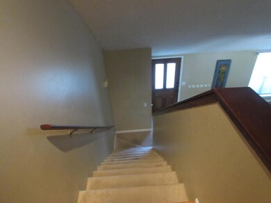 Upstairs has 2 bedrooms and 1 bath