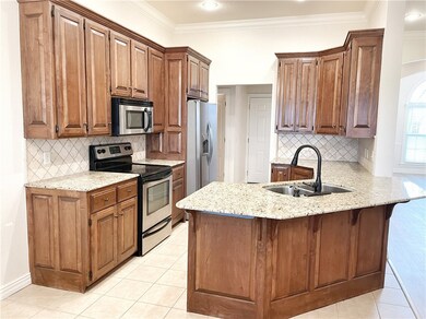 Great kitchen with view of living room and dining