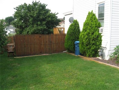 Left Side of Home... Privacy Fence around rear yar