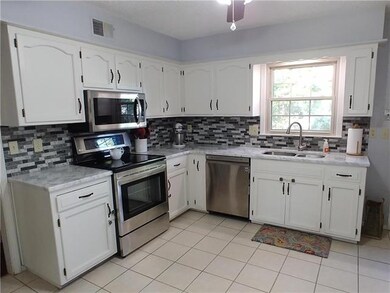 Beautiful granite and tiled backsplash