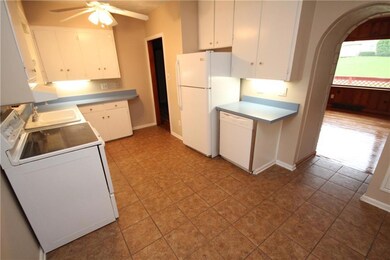 Kitchen with Refrigerator, Stove and Dishwasher