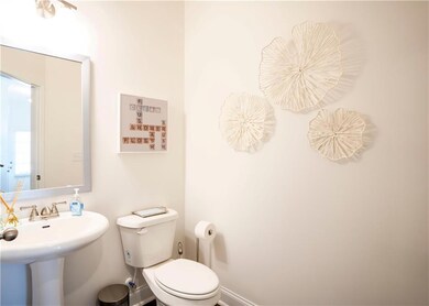 Bathroom featuring sink and toilet