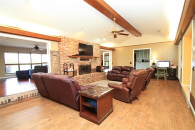 Living room featuring hardwood / wood-style floori