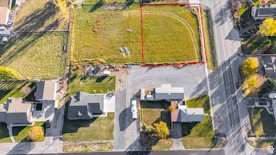 Aerial overview of property's location with property parcel outlined