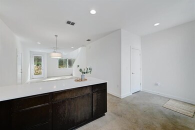 Kitchen with recessed lighting, light countertops