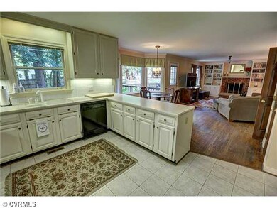 Kitchen - Kitchen has corian countertops, tile flo