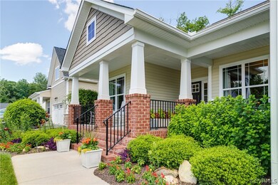 Beautiful landscaping enhances the front entry