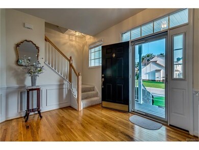Front door has upgraded window blinds and transiti