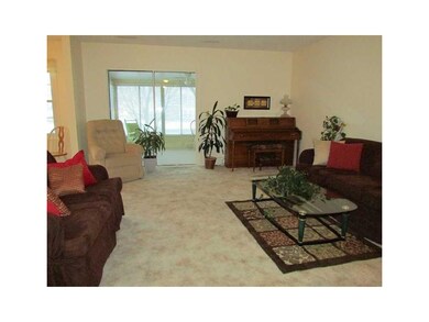 Living Room. Large living room opens to 3 season r