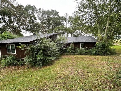 View of front of property with a front lawn