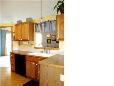 Opening above kitchen sink keeps you connected to 