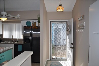 LOOKING AT THE FRONT ENTRY FROM INSIDE.