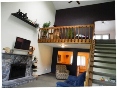 loft overlooks the great room with wbfp