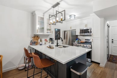 Kitchen featuring appliances with stainless steel