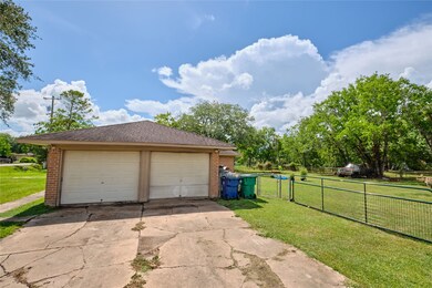 Oversized back yard, side view. Front door faces Lazy Lane.