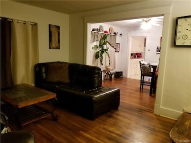 Unit 1, living room open into dining room