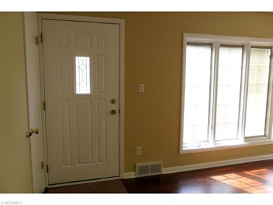 newer front door and Pella windows w/encased shade