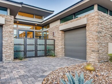 CUSTOM GATED ENTRANCE TO COURTYARD