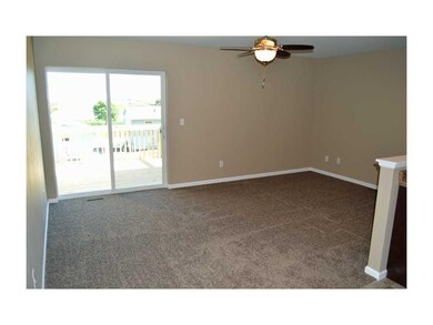 . Living Room & Sliders to Back Deck