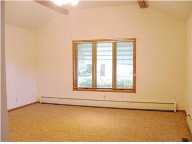 Master bedroom with vaulted ceiling