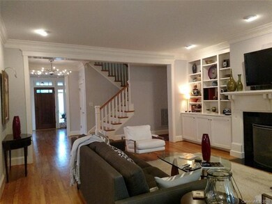 Family room has gas fireplace, built-in book cases
