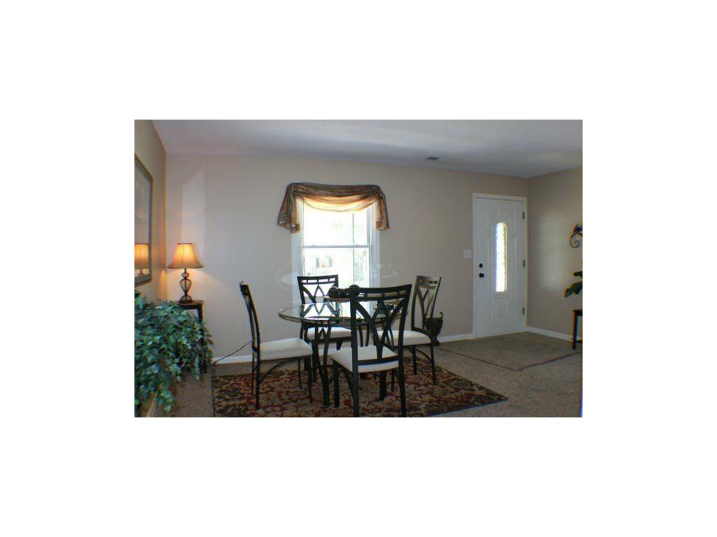 Living Room with Front Door set up as an eating ar