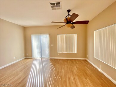 Living room with laminate flooring.