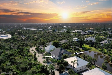 Aerial view at dusk with a water view