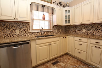 Under-mount sink, pendant light and custom window
