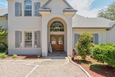 Entrance to property with brick siding and roof w
