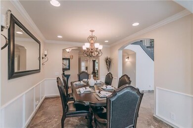 The open floor plan flows so nicely throughout the house. Here's the formal dining area, still open to the rest of the living areas. 