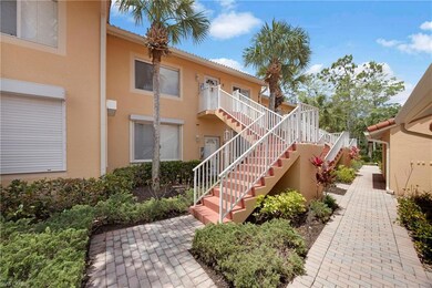 View of property featuring stairs
