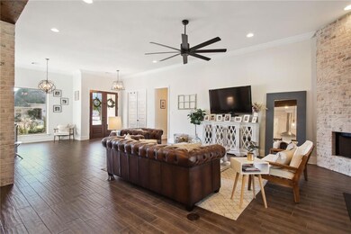 Living room with brick fireplace
