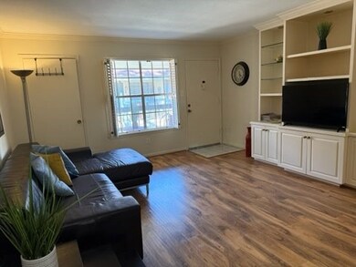 Bright and inviting living room with laminate-wood