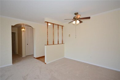 The front door opens to a hard surface entry which