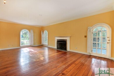 View of Living Room from rear Dining Room.  Door t