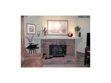 Lovely fireplace adds a cozy warmth to this condo.
