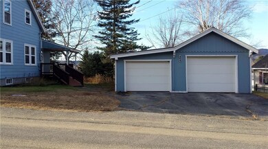 2 car garage with tar driveway.