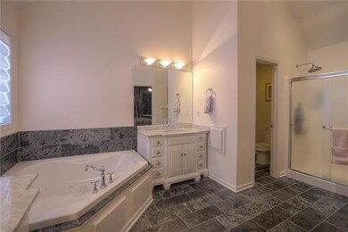 The master bath is a WOW! Heated tile floors, doub