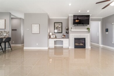 Thoughtfully designed with a cozy fireplace, built