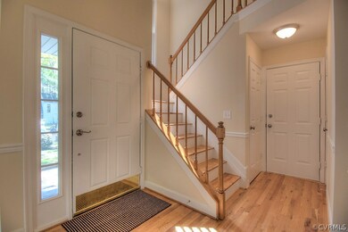 Hardwood floors and moldings abound in this gorgeo