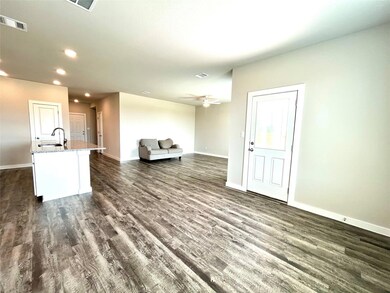 Living room featuring recessed lighting, baseboar