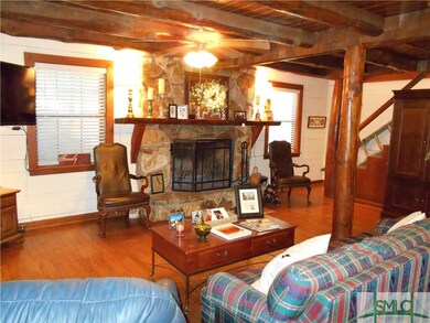 Beautiful and inviting Great Room with large stone